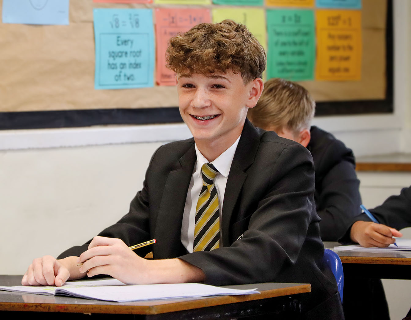 Boy smiling in a lesson